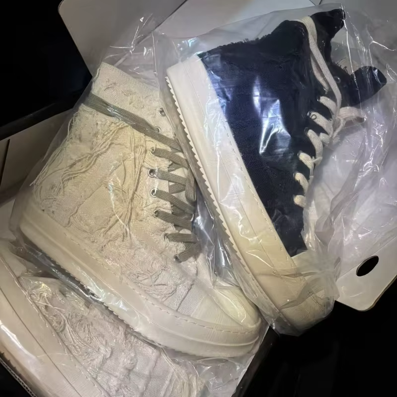 Nouvelles chaussures décontractées d'été pour hommes à semelle épaisse avec lacets à pompons, basket