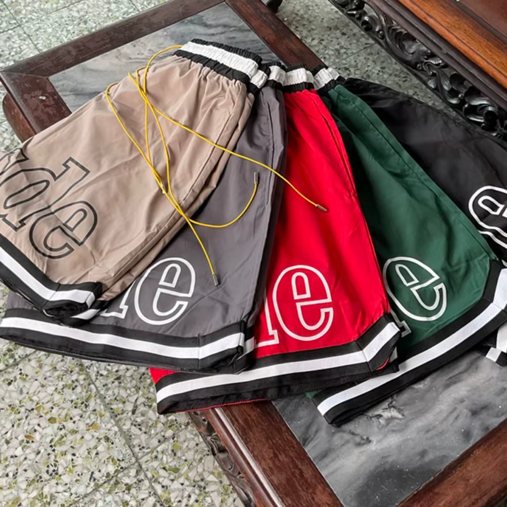 Shorts Rhude pour hommes, plusieurs styles, imprimé logo, ample, respirant, séchage rapide, poches en maille, shorts de sport de plage, haute qualité