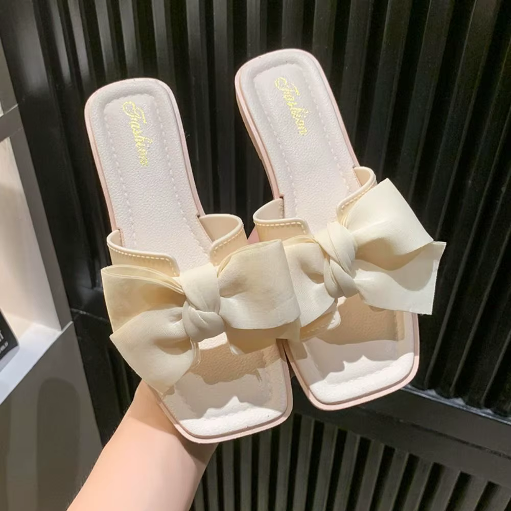 Pantoufles élégantes à semelle souple avec nœud papillon