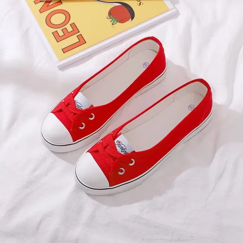 Baskets en toile blanches peu profondes pour femmes