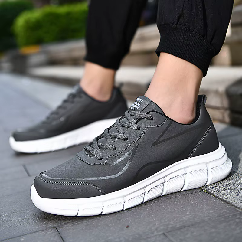 Chaussures de course noires en cuir imperméables
