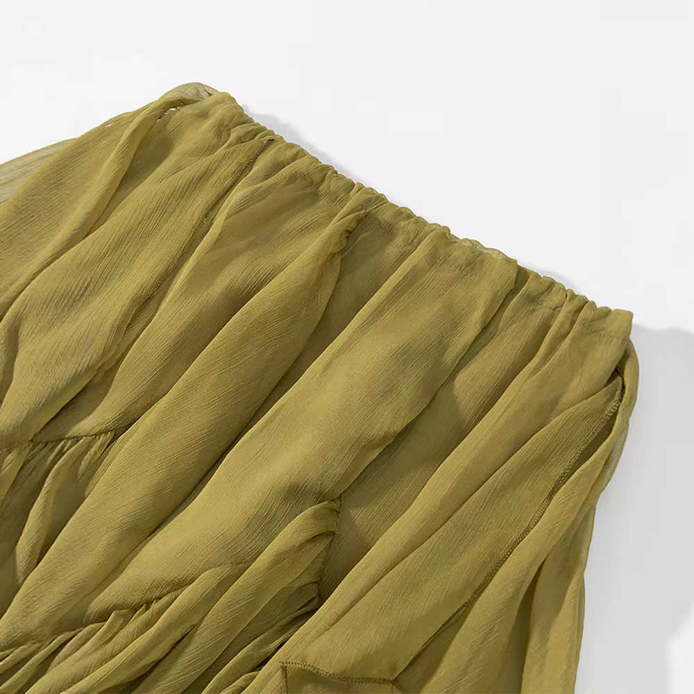 Vêtements pour femmes printemps/été 2025 : élégant, polyvalent, design simple, jupe longue plissée en mousseline de soie à volants