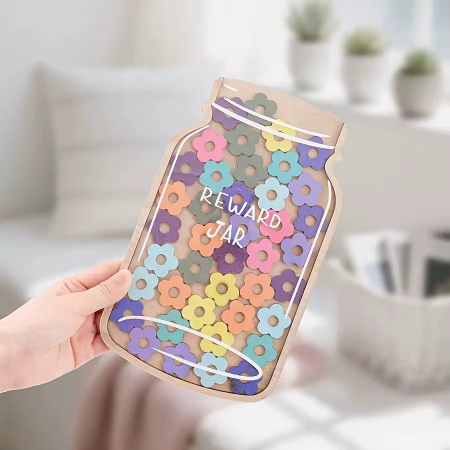 Un ensemble de pots de récompense en forme d'étoiles ou de fleurs, avec 45 étoiles ou fleurs, présentant des motifs floraux vibrants, servant de motivation pour un comportement positif.
