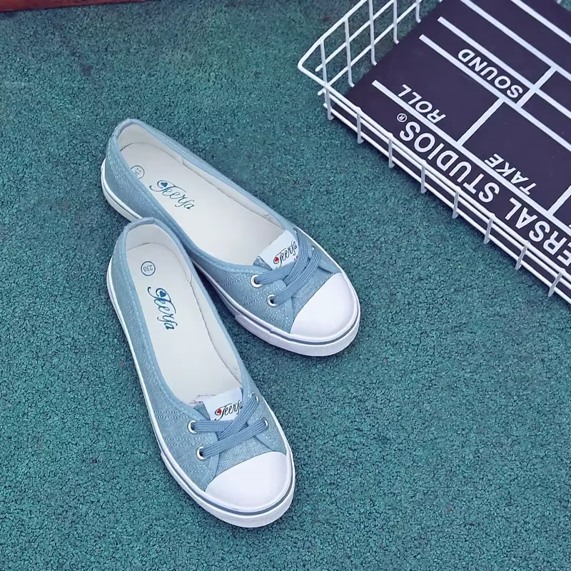 Baskets en toile blanches peu profondes pour femmes