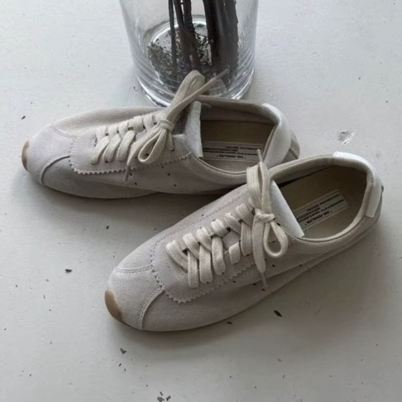 Chaussures de sport décontractées plates à lacets en cuir véritable pour femmes