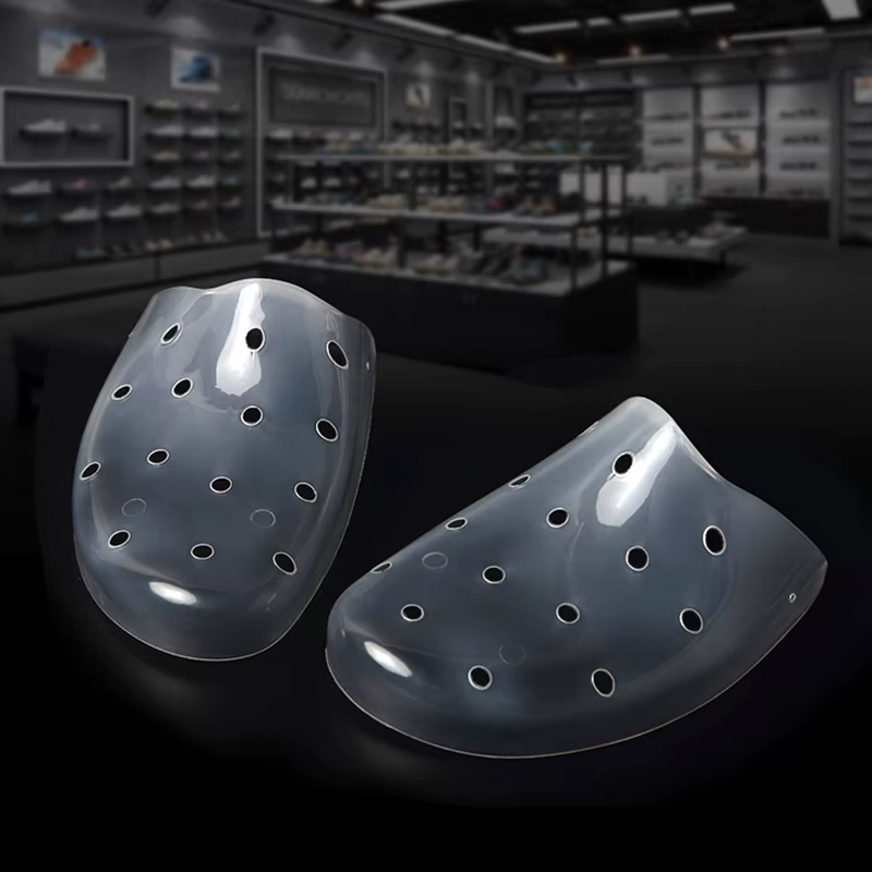 Bouclier anti-pli déformable pour chaussures de sport