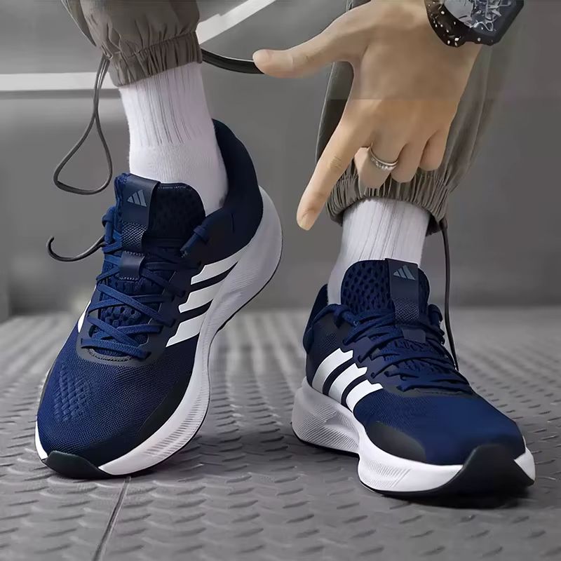 Adidas Chaussures de course légères et respirantes en maille bleu marine à trois bandes JR5851