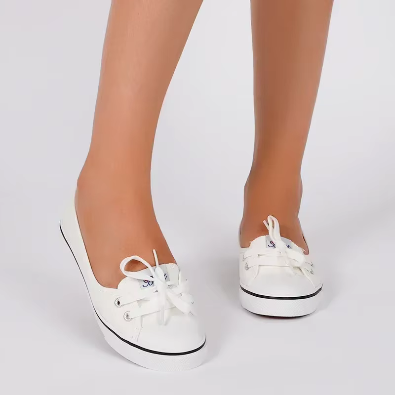 Baskets en toile blanches peu profondes pour femmes