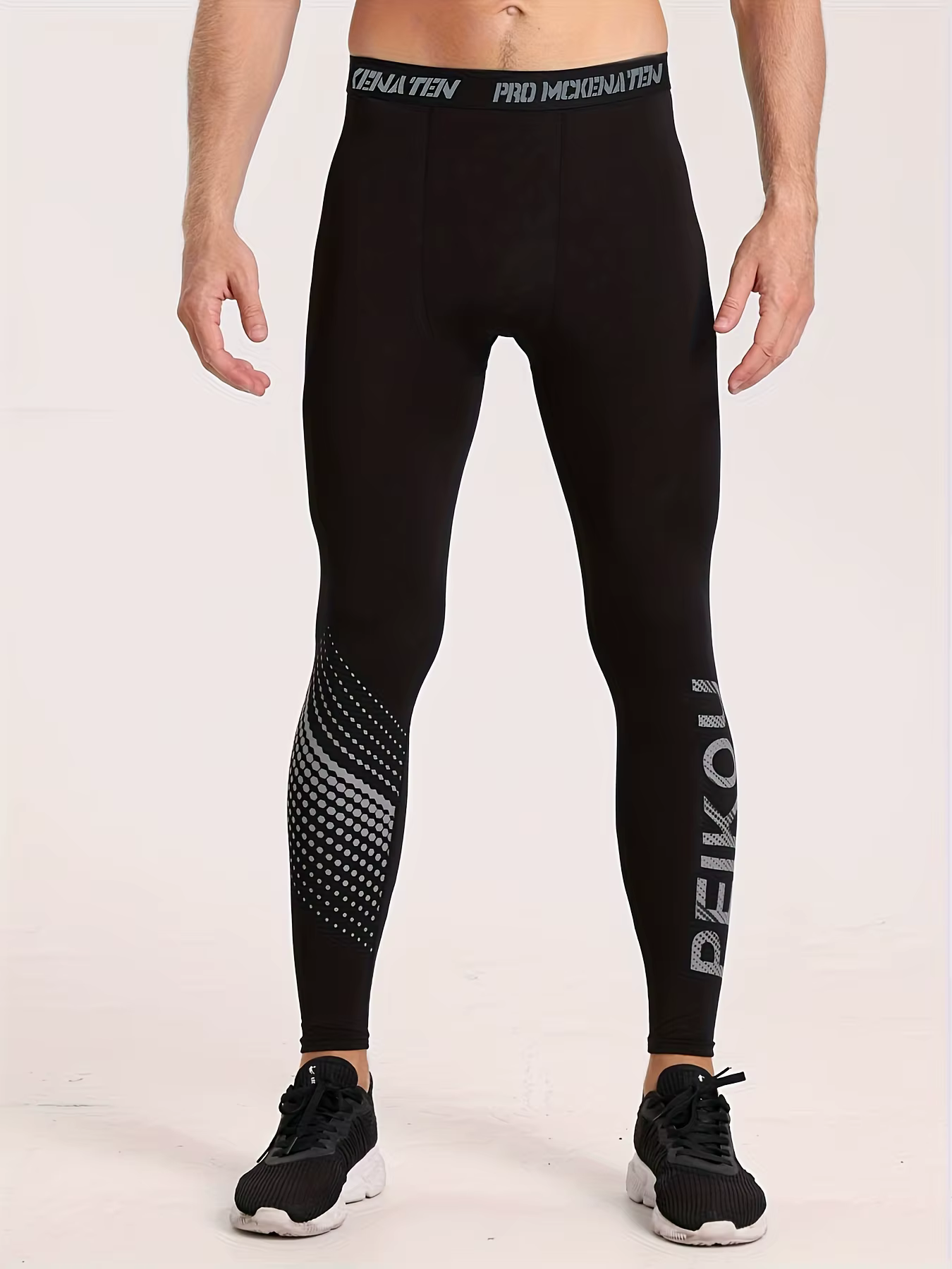Pantalons serrés de sport de basket-ball