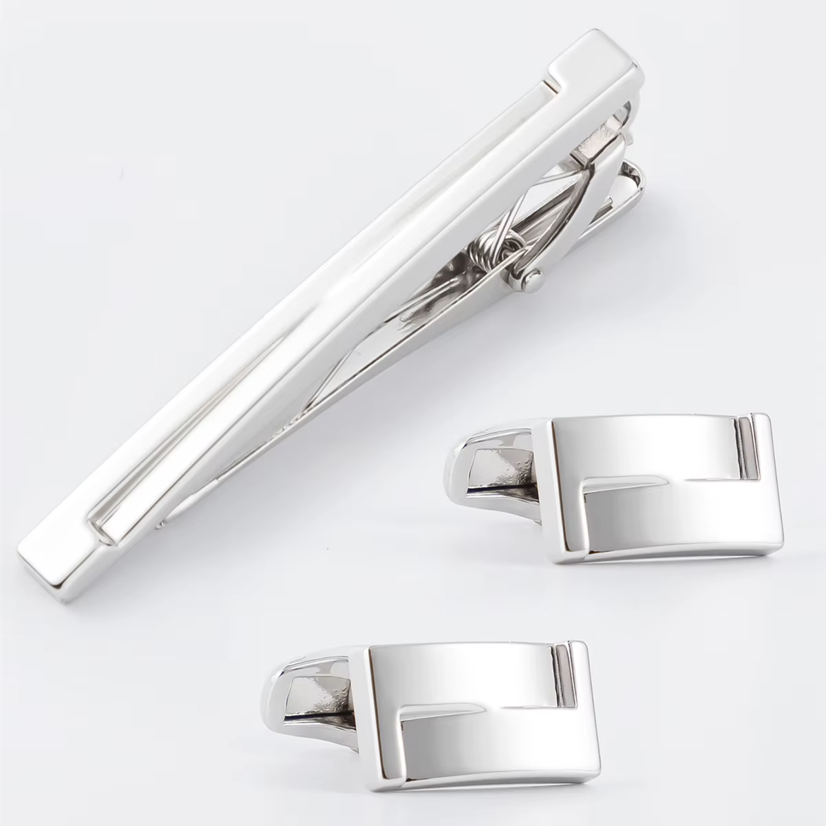 Un ensemble de boutons de manchette pour homme, surface lisse et brillante, accessoire essentiel pour chemises formelles, rehaussez instantanément votre style