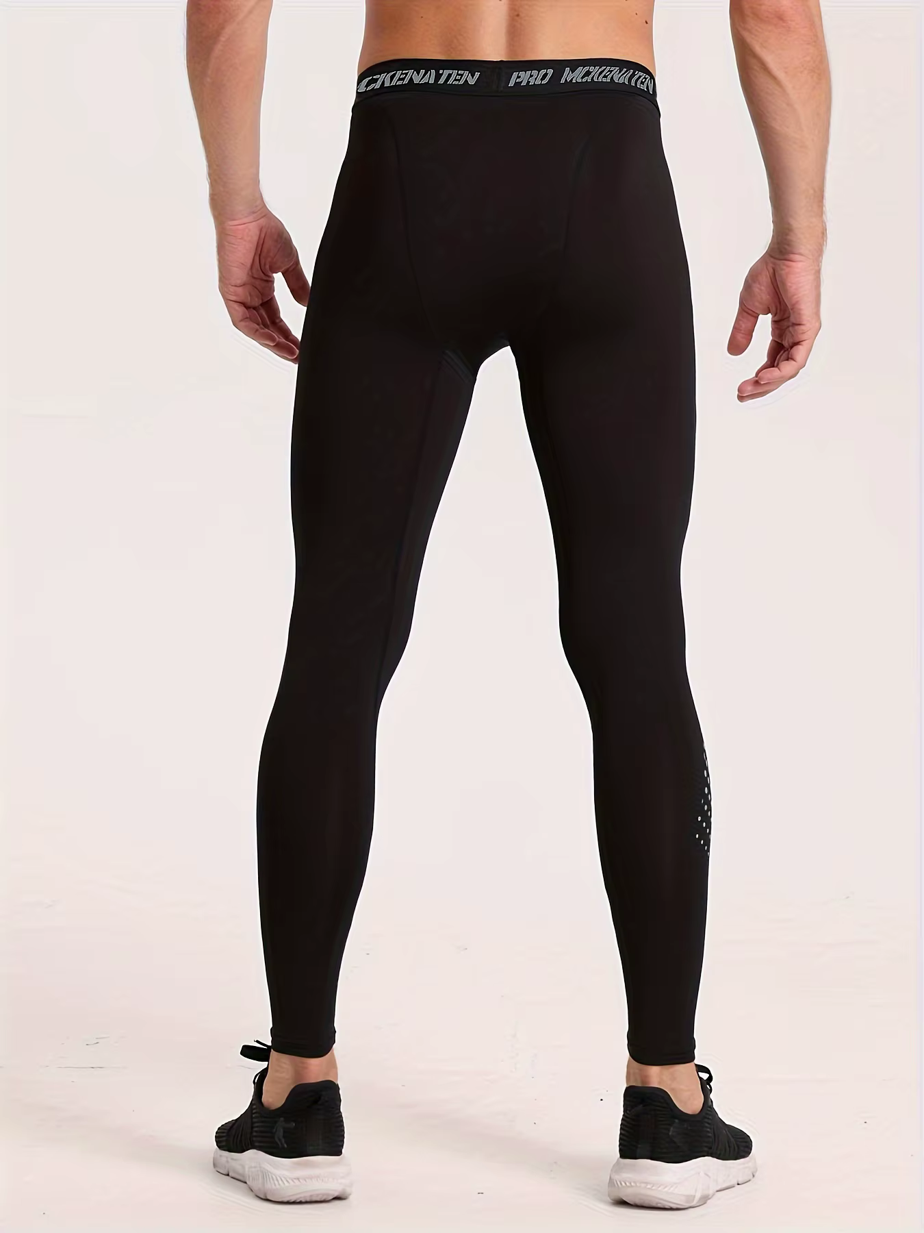 Pantalons serrés de sport de basket-ball