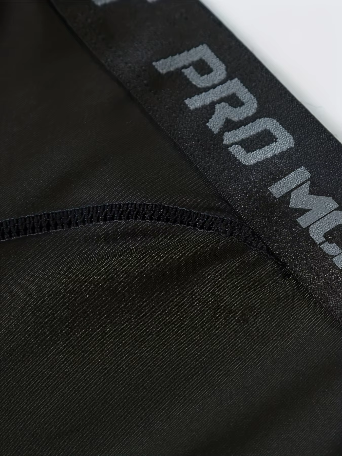 Pantalons serrés de sport de basket-ball