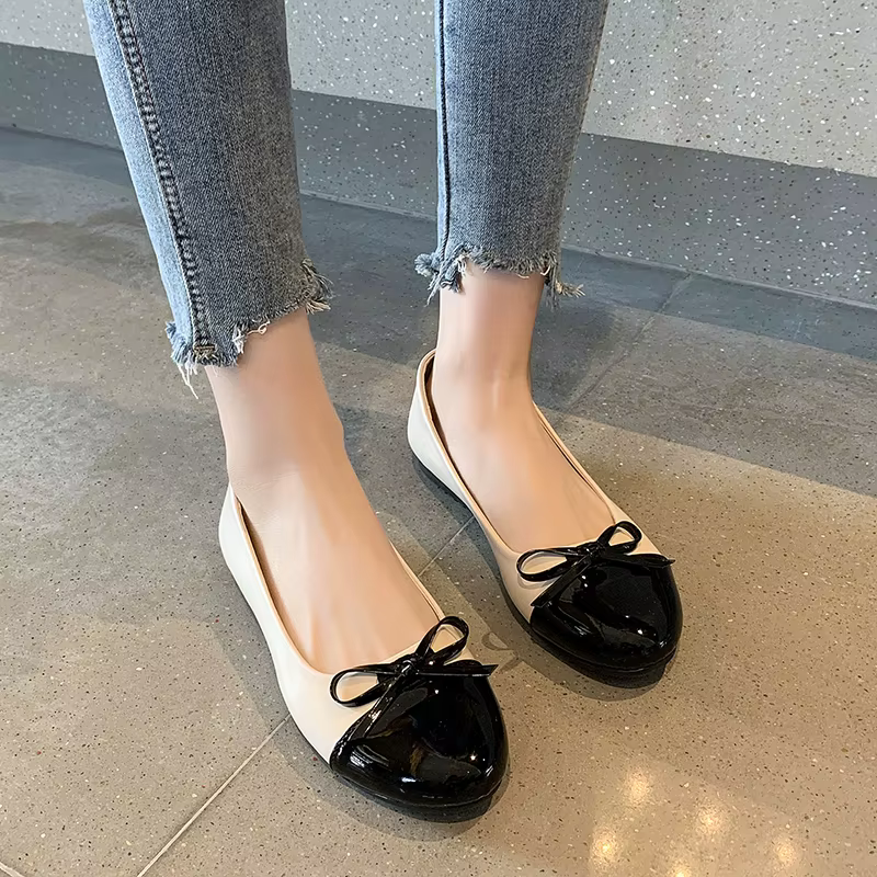 Ballerines à nœud bicolores noir et beige