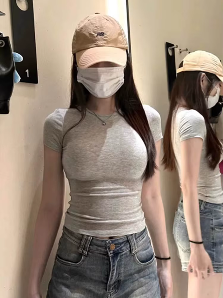 T-shirt à épaules épicées de style américain pour femmes en été 2025, haut court ajusté et amincissant, court élastique de base s