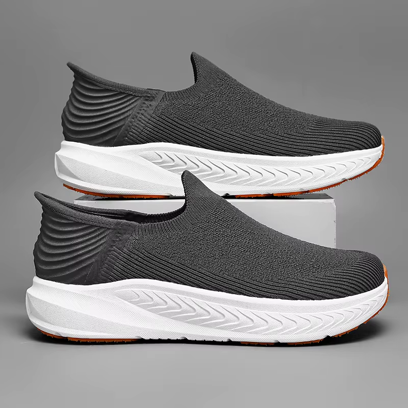 Chaussures de course noires en tricot pour hommes