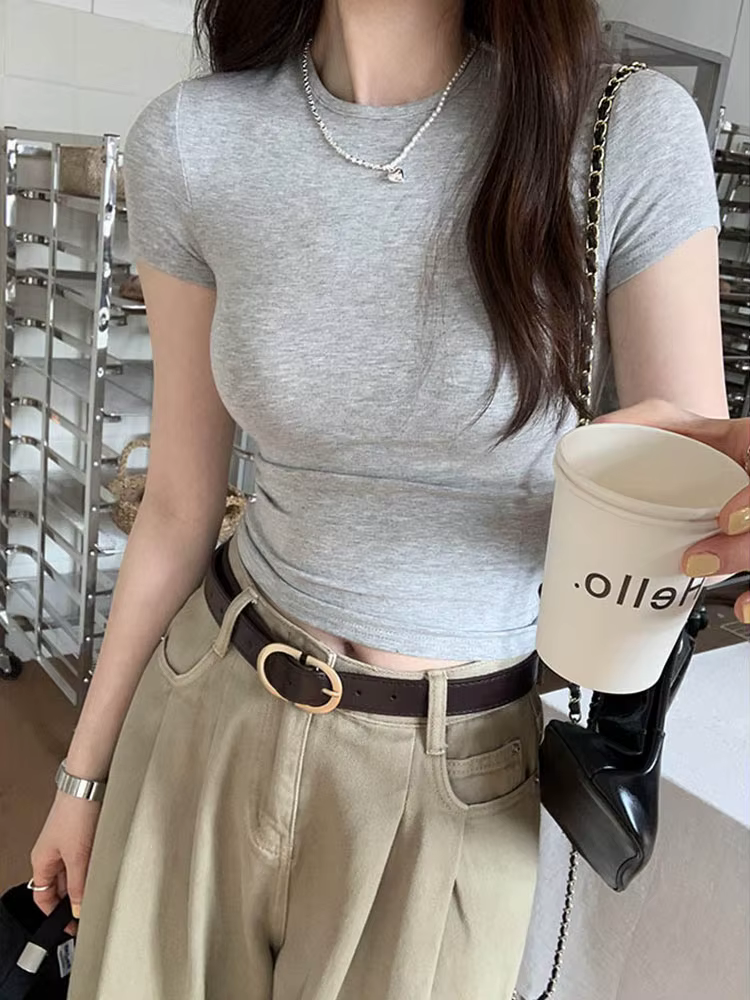 T-shirt à épaules épicées de style américain pour femmes en été 2025, haut court ajusté et amincissant, court élastique de base s