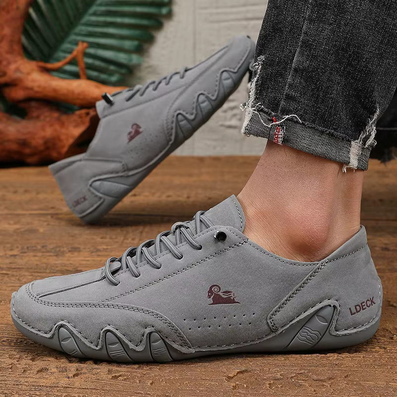 Printemps hommes coupe basse en cuir Sneaker mocassins à semelles souples anti-dérapant fond plat chaussures décontractées grande taille Zapatillas Para Hombre 2025